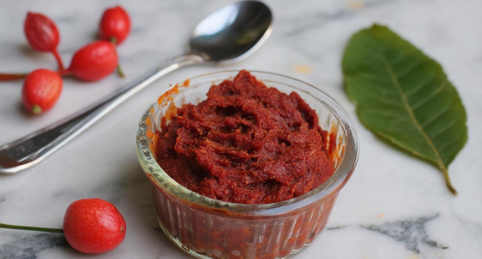 Fresh ripe Surinam cherries (pitanga) with vibrant red color, perfect for making jams, salsas, and desserts